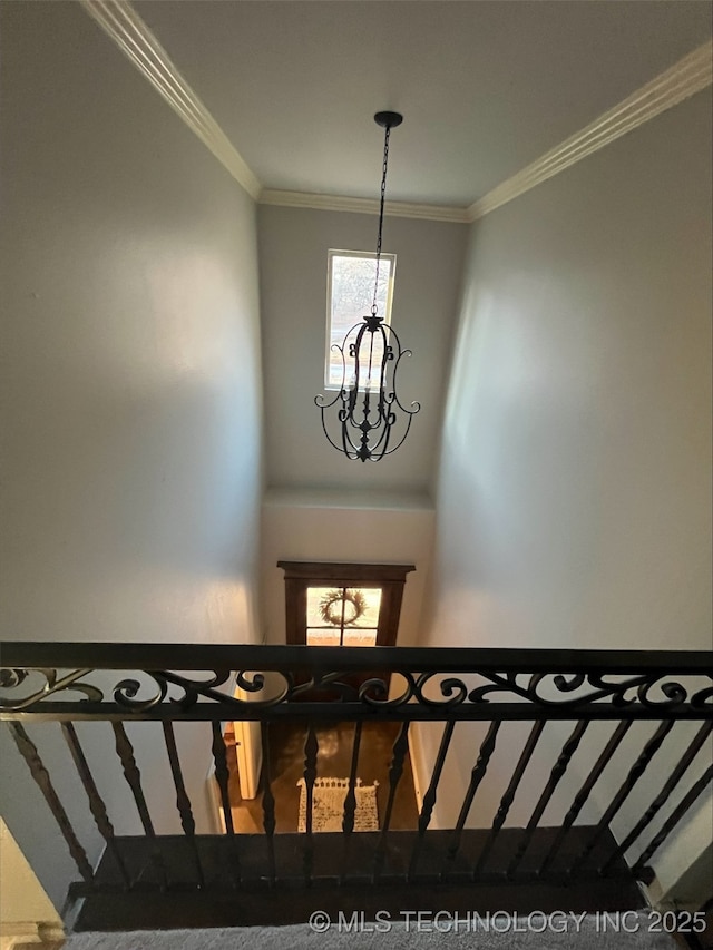 239 E 117th St S, Jenks, OK 74037 - stairs featuring a chandelier and crown molding