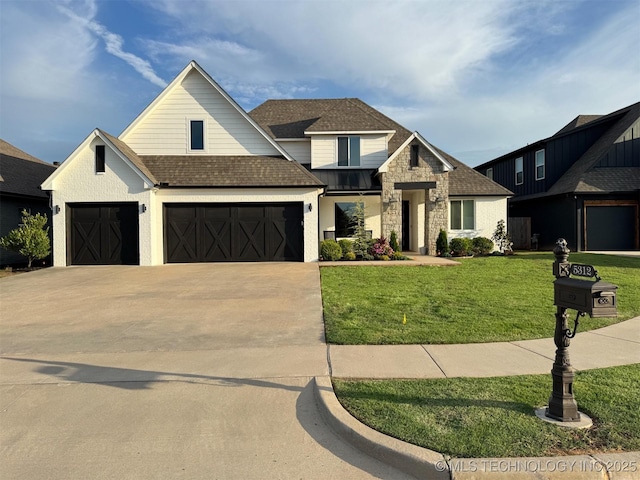 5312 E 124th Pl S, Bixby, OK 74008 - view of front of house with a front lawn, roof with shingles, concrete driveway, a standing seam roof, and stone siding