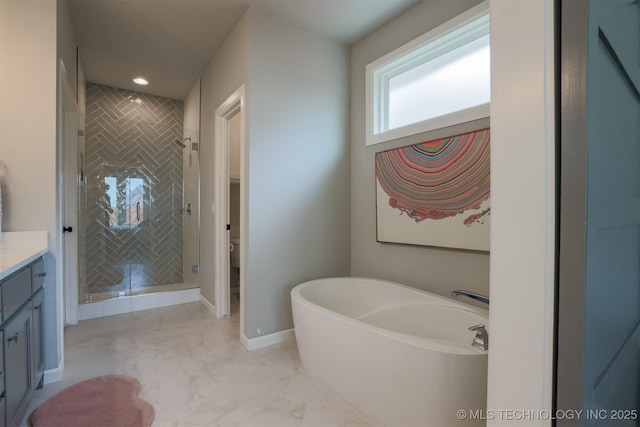 5312 E 124th Pl S, Bixby, OK 74008 - full bath with a freestanding tub, vanity, a stall shower, marble look tiles, and recessed lighting