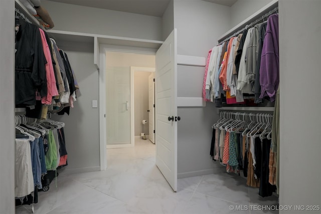 5312 E 124th Pl S, Bixby, OK 74008 - spacious closet featuring marble look tile flooring