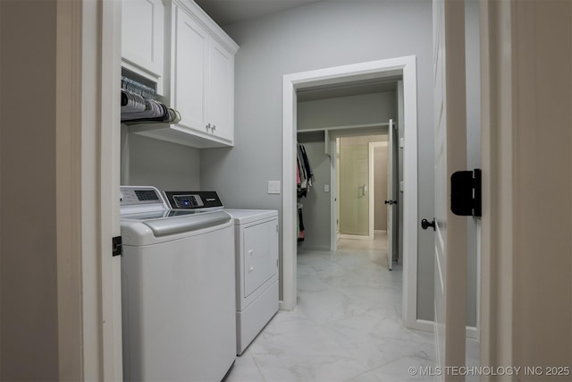5312 E 124th Pl S, Bixby, OK 74008 - laundry room featuring separate washer and dryer, cabinet space, and light marble finish flooring