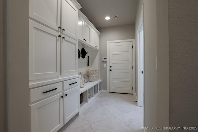 5312 E 124th Pl S, Bixby, OK 74008 - mudroom featuring light marble finish flooring and recessed lighting
