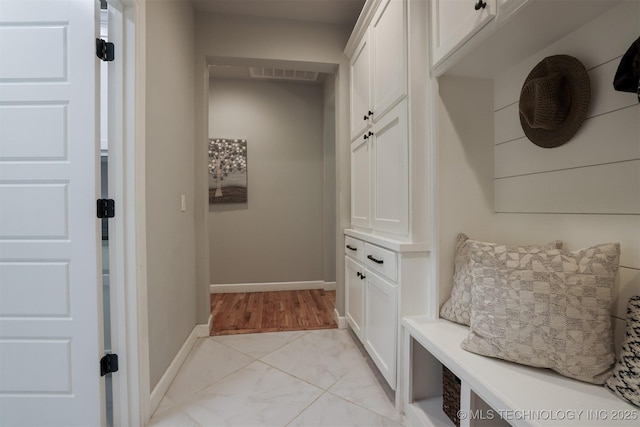 5312 E 124th Pl S, Bixby, OK 74008 - mudroom featuring light marble finish flooring and baseboards