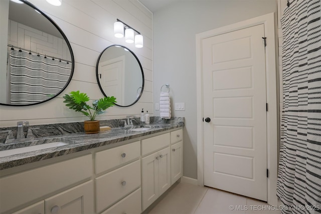 5312 E 124th Pl S, Bixby, OK 74008 - full bath featuring double vanity, tile patterned flooring, and a shower with shower curtain