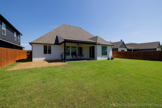 5312 E 124th Pl S, Bixby, OK 74008 - rear view of house featuring a fenced backyard, a ceiling fan, and a shingled roof