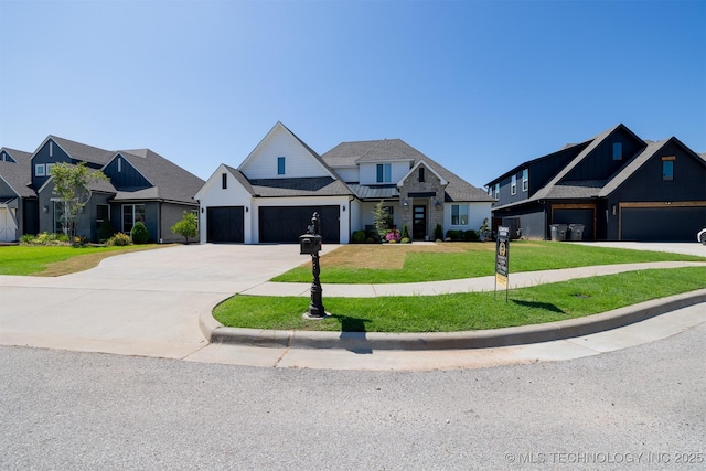 5312 E 124th Pl S, Bixby, OK 74008 - view of front of home featuring a garage, a front yard, concrete driveway, and a residential view