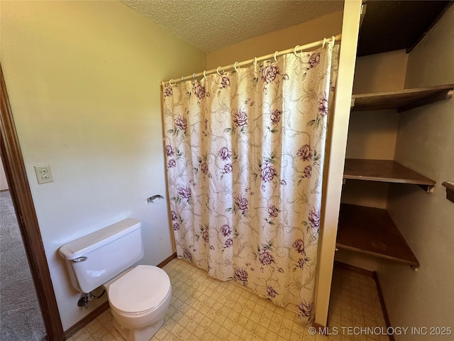 109948 S 4155, Checotah, OK 74426 - bathroom featuring tile patterned floors, a textured ceiling, and a shower with shower curtain