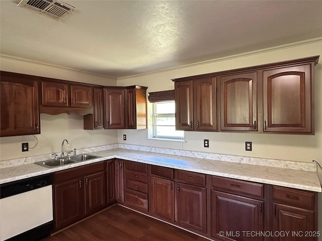 109948 S 4155, Checotah, OK 74426 - kitchen featuring white dishwasher, light countertops, dark wood-style floors, and dark brown cabinetry
