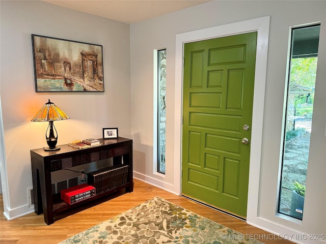 2501 Cherokee Hills Pl, Bartlesville, OK 74006 - entryway with wood finished floors and baseboards
