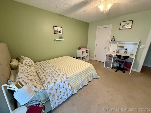 2501 Cherokee Hills Pl, Bartlesville, OK 74006 - carpeted bedroom with a textured ceiling and baseboards