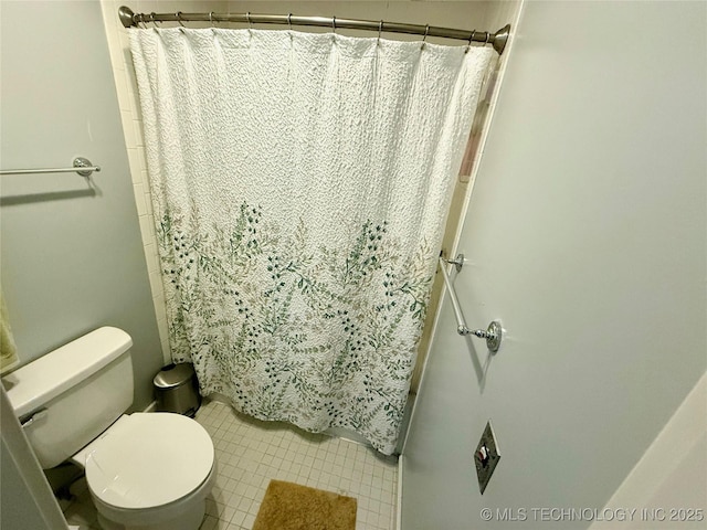 2501 Cherokee Hills Pl, Bartlesville, OK 74006 - bathroom featuring curtained shower and tile patterned flooring