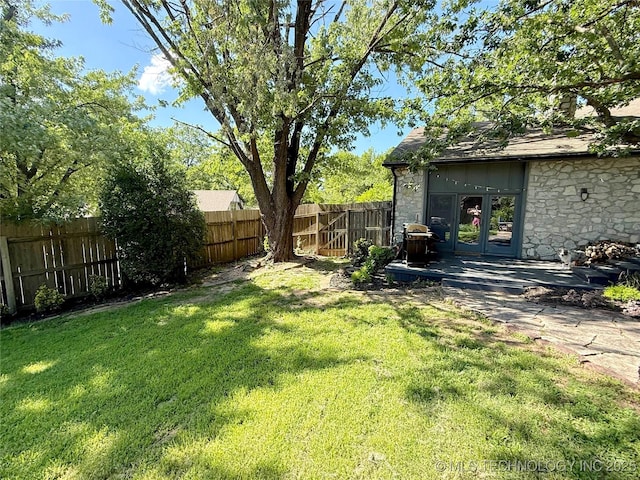 2501 Cherokee Hills Pl, Bartlesville, OK 74006 - view of yard featuring french doors