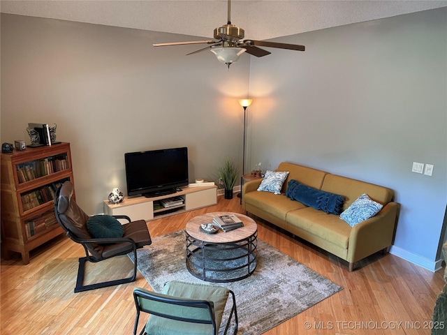 2501 Cherokee Hills Pl, Bartlesville, OK 74006 - living area with a ceiling fan and wood finished floors