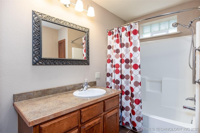 609 Lakeshore Dr, Durant, OK 74701 - full bathroom featuring vanity and shower / tub combo with curtain