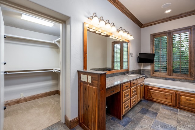 609 Lakeshore Dr, Durant, OK 74701 - bathroom featuring ornamental molding, vanity, and a garden tub