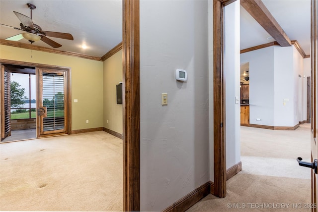 609 Lakeshore Dr, Durant, OK 74701 - hallway featuring carpet floors, crown molding, and beamed ceiling