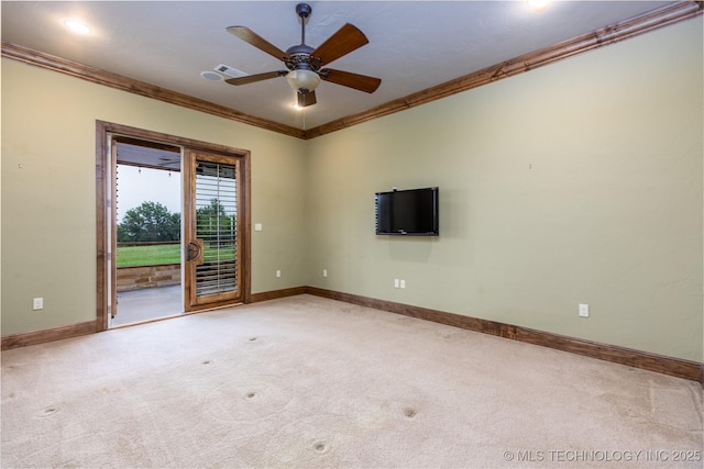609 Lakeshore Dr, Durant, OK 74701 - carpeted empty room featuring ornamental molding and a ceiling fan