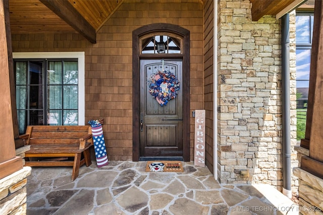13533 S Lewis Ave, Bixby, OK 74008 - property entrance featuring stone siding and covered porch