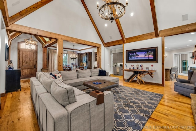 13533 S Lewis Ave, Bixby, OK 74008 - living room featuring a chandelier, beam ceiling, light wood-type flooring, high vaulted ceiling, and recessed lighting