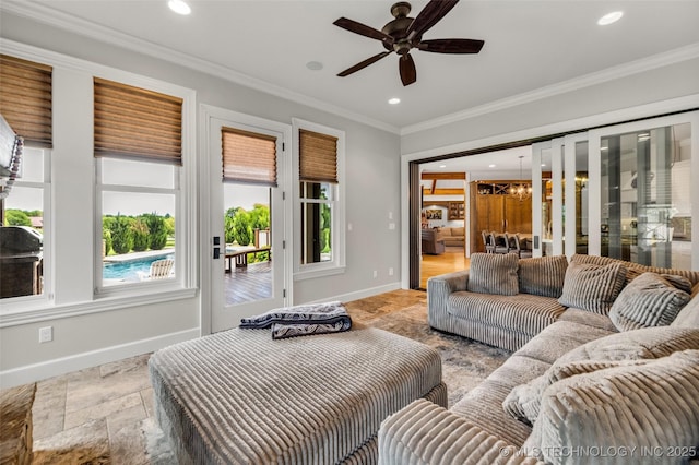 13533 S Lewis Ave, Bixby, OK 74008 - living area with stone tile flooring, recessed lighting, ceiling fan, crown molding, and a chandelier