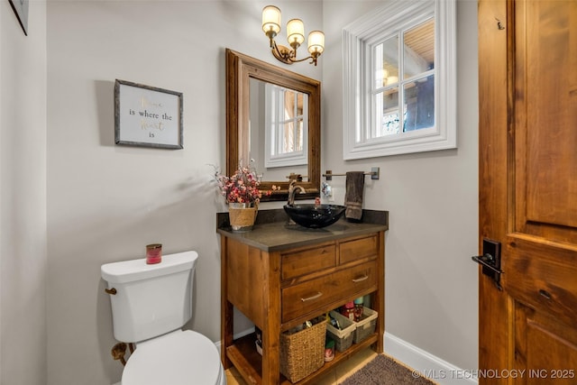 13533 S Lewis Ave, Bixby, OK 74008 - bathroom with vanity and a chandelier