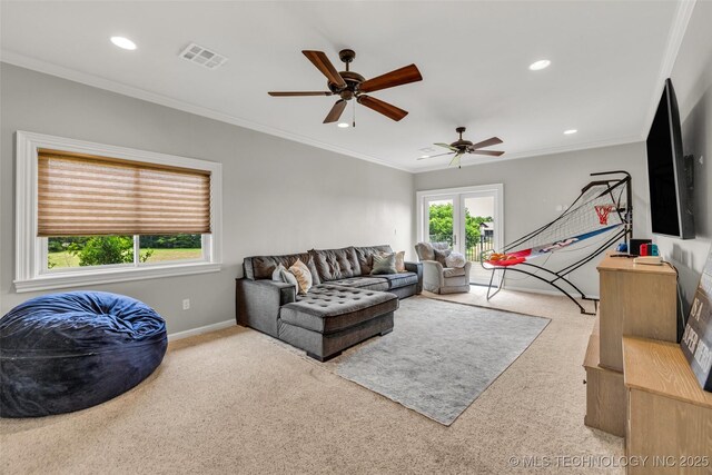 13533 S Lewis Ave, Bixby, OK 74008 - carpeted living room featuring a ceiling fan, recessed lighting, and ornamental molding