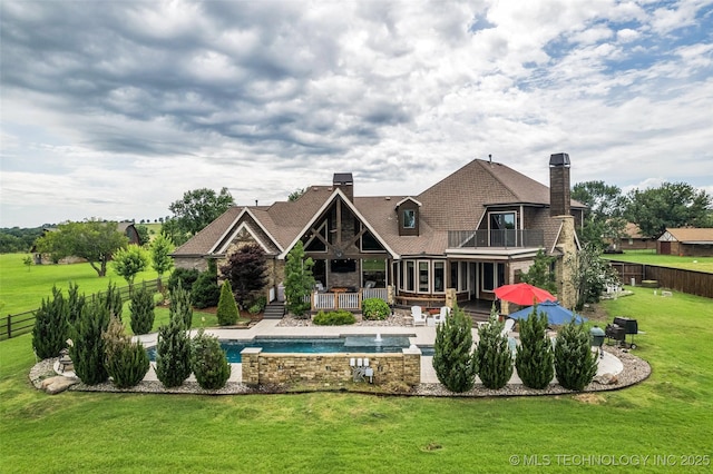 13533 S Lewis Ave, Bixby, OK 74008 - rear view of property with a balcony, a chimney, a jacuzzi, and a patio area