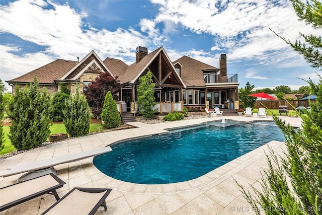 13533 S Lewis Ave, Bixby, OK 74008 - outdoor pool with a patio and a diving board