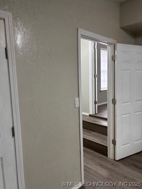 1200 S Mckinley Ave, Calera, OK 74730 - corridor featuring wood finished floors