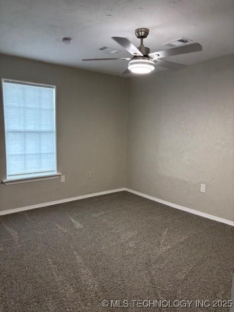 1200 S Mckinley Ave, Calera, OK 74730 - carpeted spare room featuring ceiling fan and baseboards