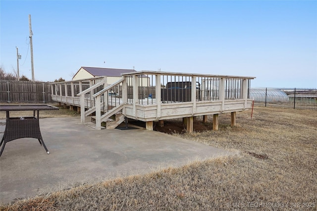 740384 S 3480th Rd, Cushing, OK 74023 - rear view of house with a deck, a fenced backyard, and a patio area
