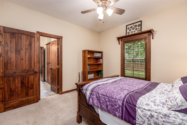 214 Kernel, Durant, OK 74701 - bedroom with light carpet and a ceiling fan