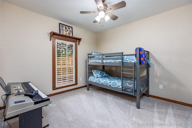214 Kernel, Durant, OK 74701 - carpeted bedroom featuring a desk and ceiling fan