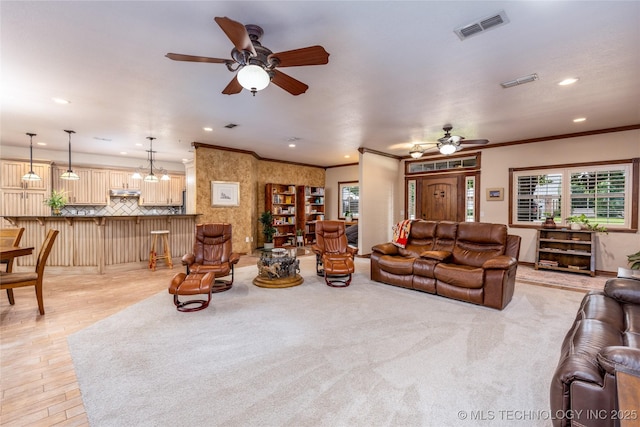 214 Kernel, Durant, OK 74701 - living room with a ceiling fan, recessed lighting, and ornamental molding