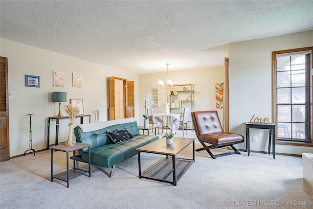 32 SE Shadowlake Dr Unit 32, Bartlesville, OK 74006 - carpeted living area featuring a chandelier and a textured ceiling