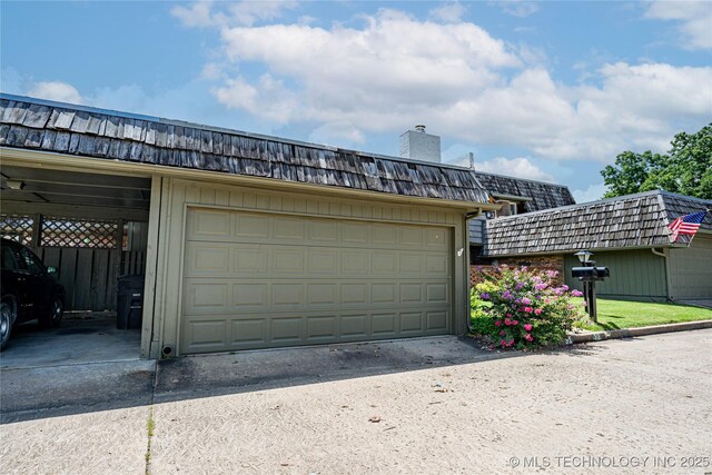 32 SE Shadowlake Dr Unit 32, Bartlesville, OK 74006 - view of garage