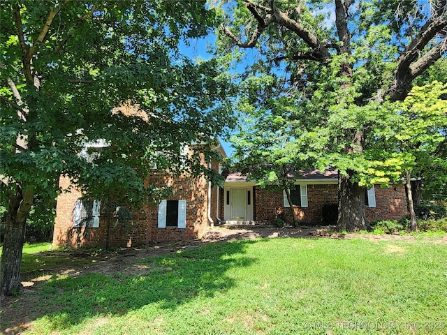 1181 Deer Crk, Pryor, OK 74361 - view of front facade featuring brick siding and a front yard