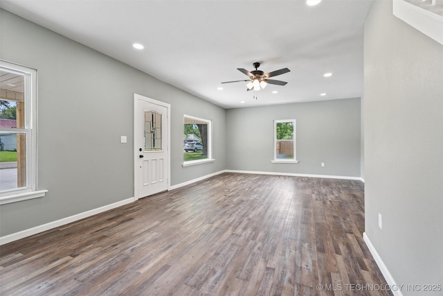 202 N Creek, Dewey, OK 74029 - spare room featuring wood finished floors, a ceiling fan, and recessed lighting