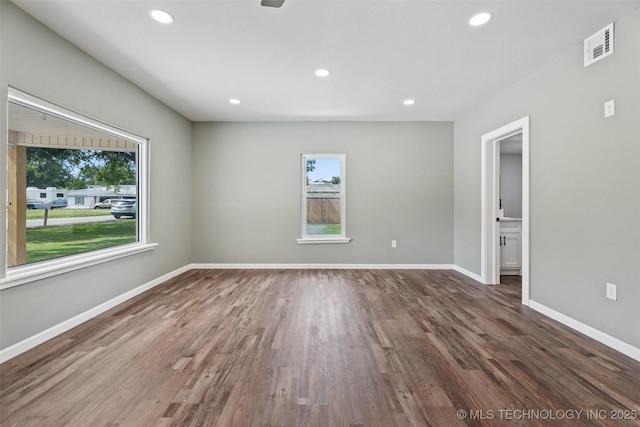 202 N Creek, Dewey, OK 74029 - empty room featuring wood finished floors and recessed lighting
