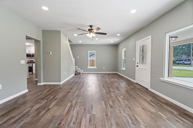 202 N Creek, Dewey, OK 74029 - unfurnished living room with ceiling fan, stairway, wood finished floors, and recessed lighting