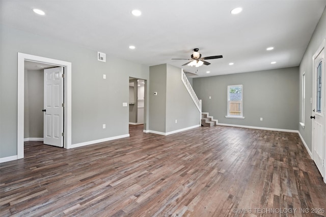 202 N Creek, Dewey, OK 74029 - unfurnished living room with recessed lighting, stairway, dark wood-style flooring, and a ceiling fan