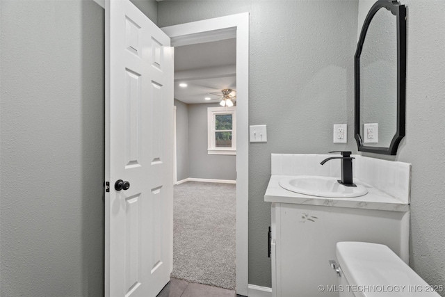 202 N Creek, Dewey, OK 74029 - bathroom with vanity and ceiling fan