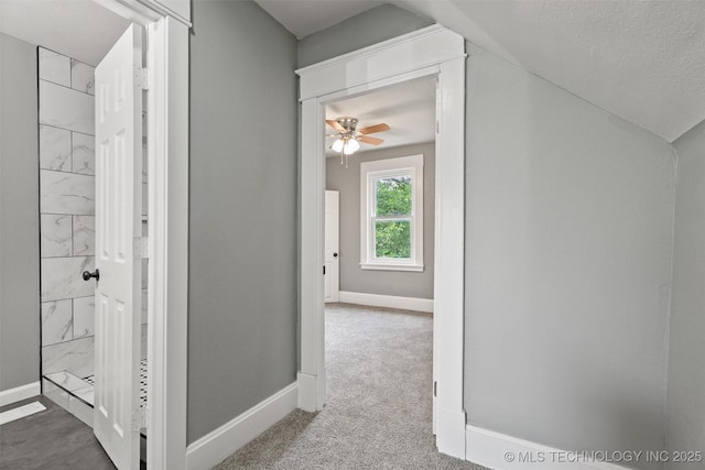 202 N Creek, Dewey, OK 74029 - hall featuring baseboards and carpet floors