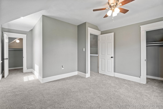202 N Creek, Dewey, OK 74029 - unfurnished bedroom with carpet flooring, vaulted ceiling, and a ceiling fan