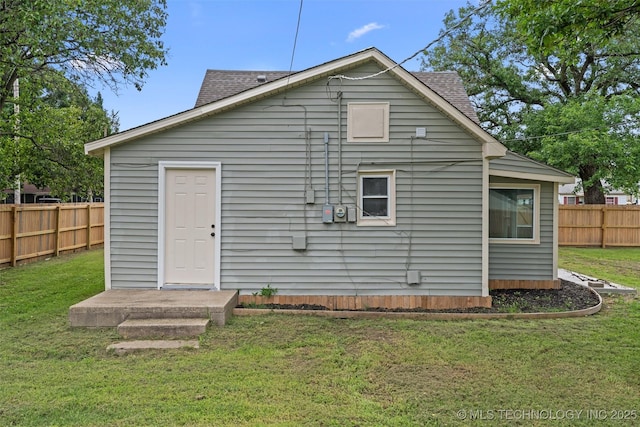 202 N Creek, Dewey, OK 74029 - rear view of property with a shingled roof