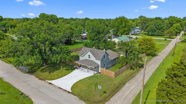 202 N Creek, Dewey, OK 74029 - view of subject property with a heavily wooded area