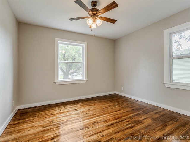 3226 N Garrison Ave, Tulsa, OK 74106 - empty room with wood finished floors and ceiling fan
