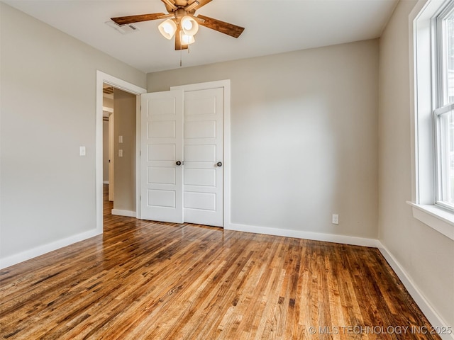 3226 N Garrison Ave, Tulsa, OK 74106 - empty room featuring a ceiling fan and wood finished floors
