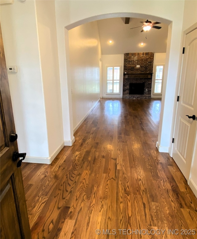 4706 S 182nd E Ave, Tulsa, OK 74134 - corridor featuring dark wood finished floors and arched walkways