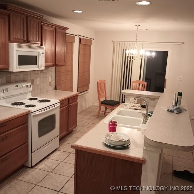 200 Ogeechee, Ramona, OK 74061 - kitchen with white appliances, light countertops, light tile patterned floors, backsplash, and pendant lighting
